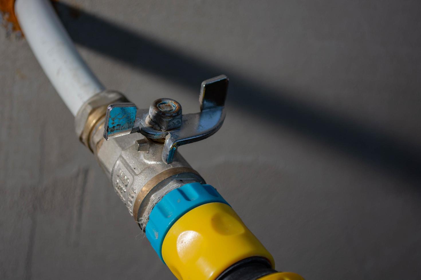 Faucet on a plastic pipe. photo