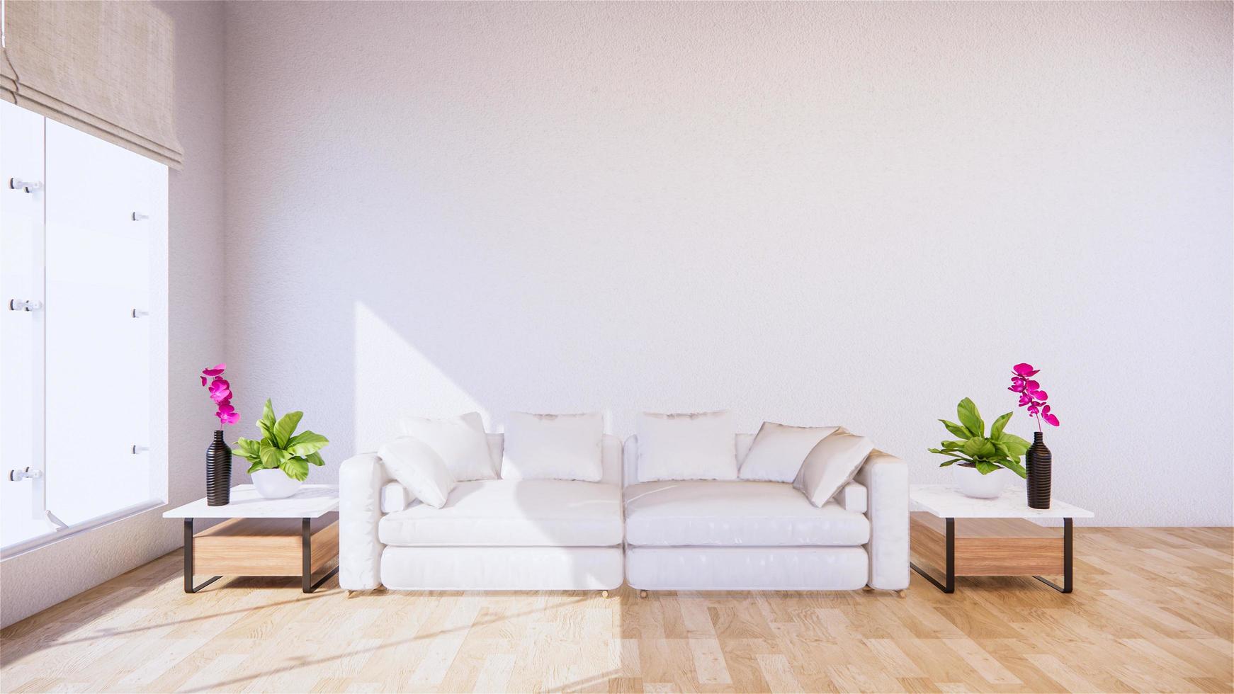 A living room with a sofa in a minimalist style White tropical style living room with wood grain floor photo