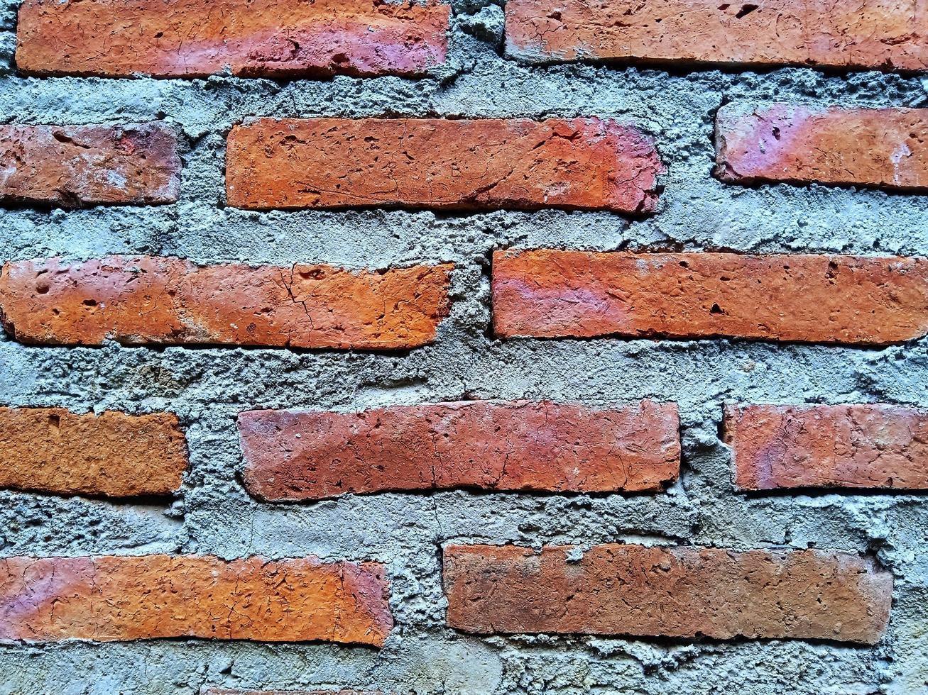 Fondo de textura de ladrillo rojo, pared de la casa foto