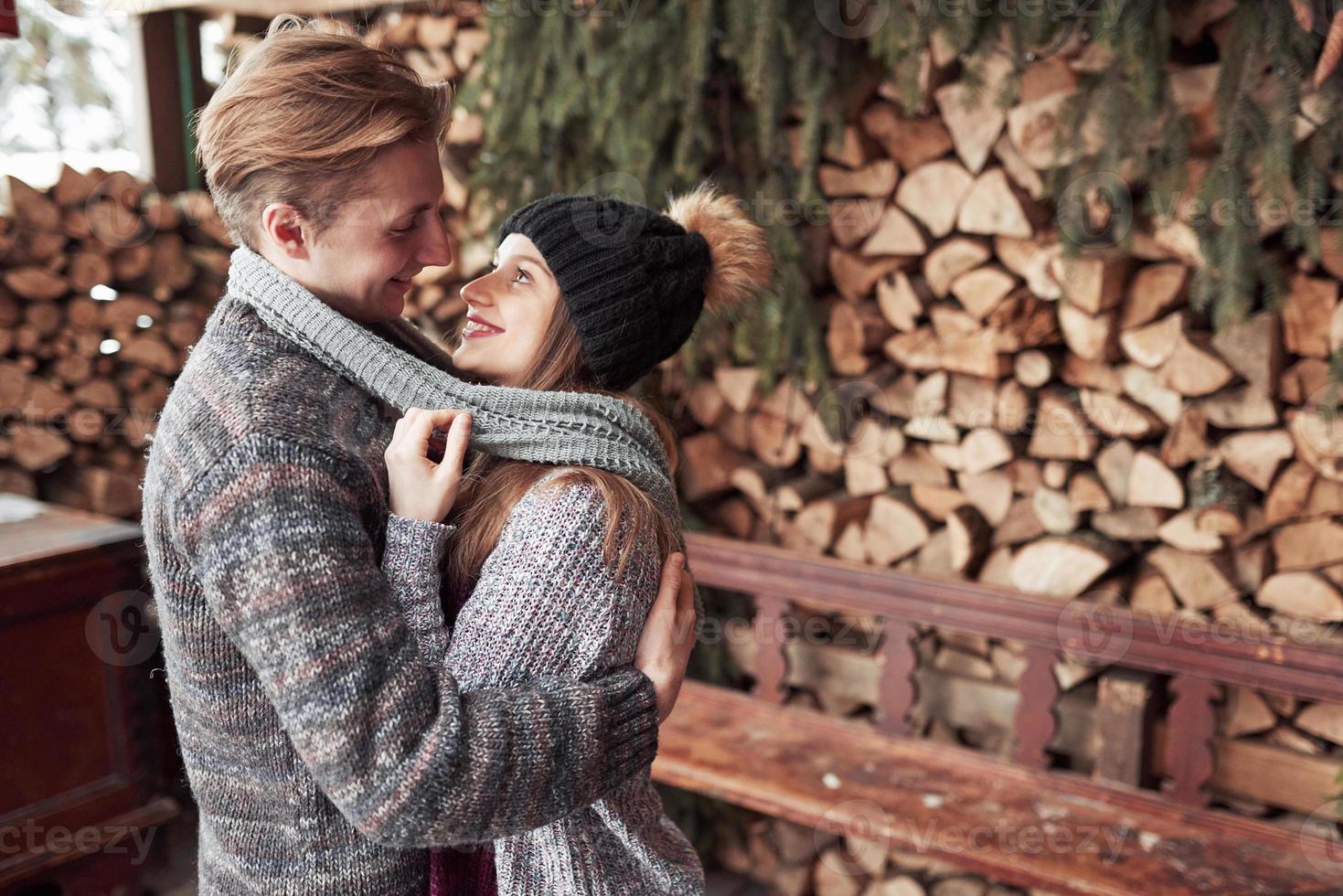 Happy Young Couple in Winter Park having fun.Family Outdoors. photo