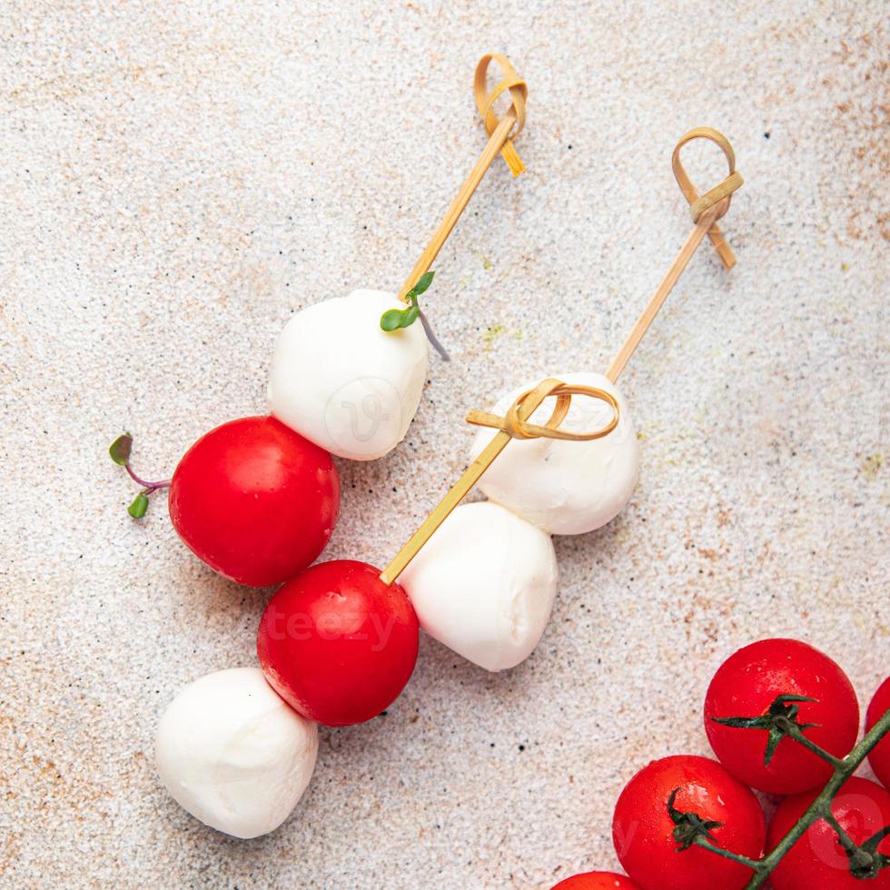 canapes mozzarella and tomato caprese salad photo