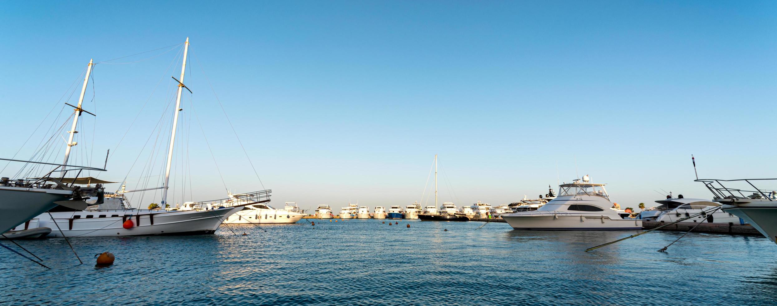 embankment street of the Red Sea in Egypt with ships boats photo