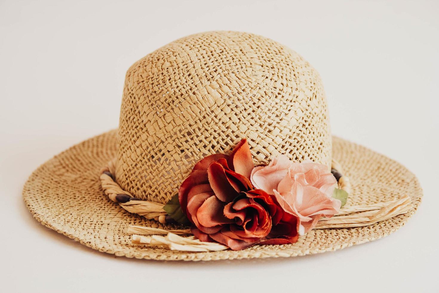 Straw hat on white background photo