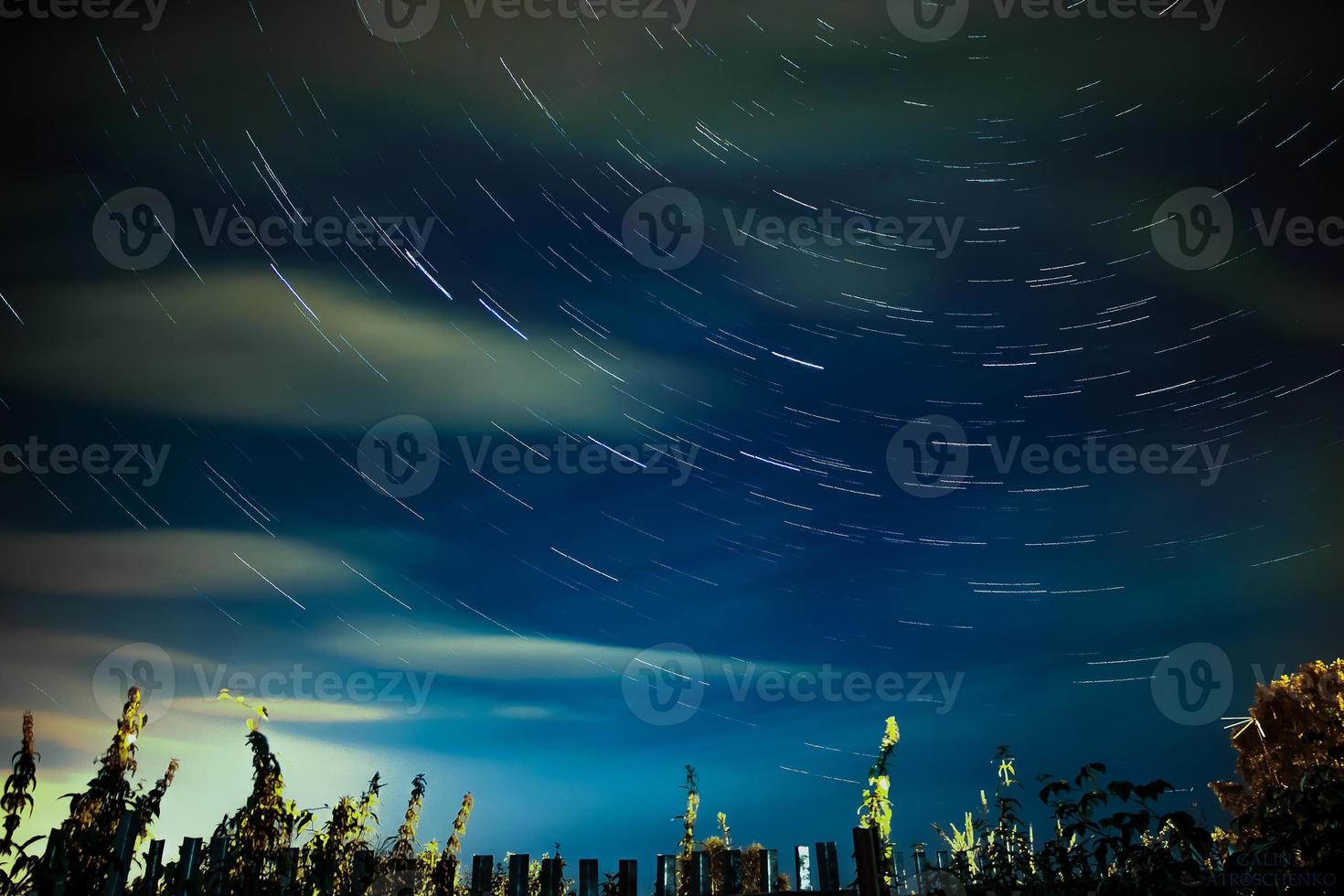 Tracks of stars. Night starry sky. photo