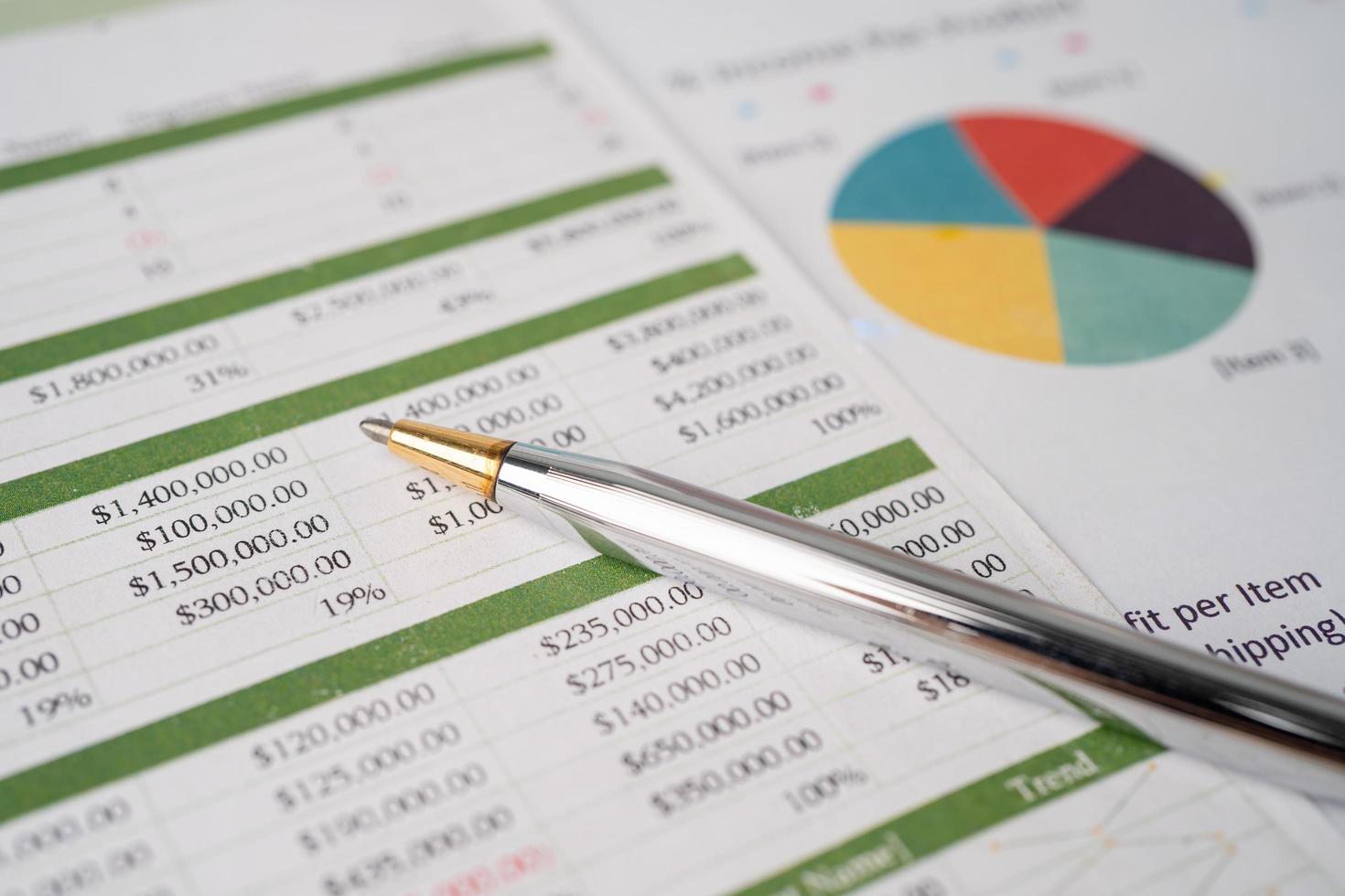 Spreadsheet table paper with pen. Finance development, Banking Account, Statistics Investment Analytic research data economy, trading, office reporting Business company concept. photo