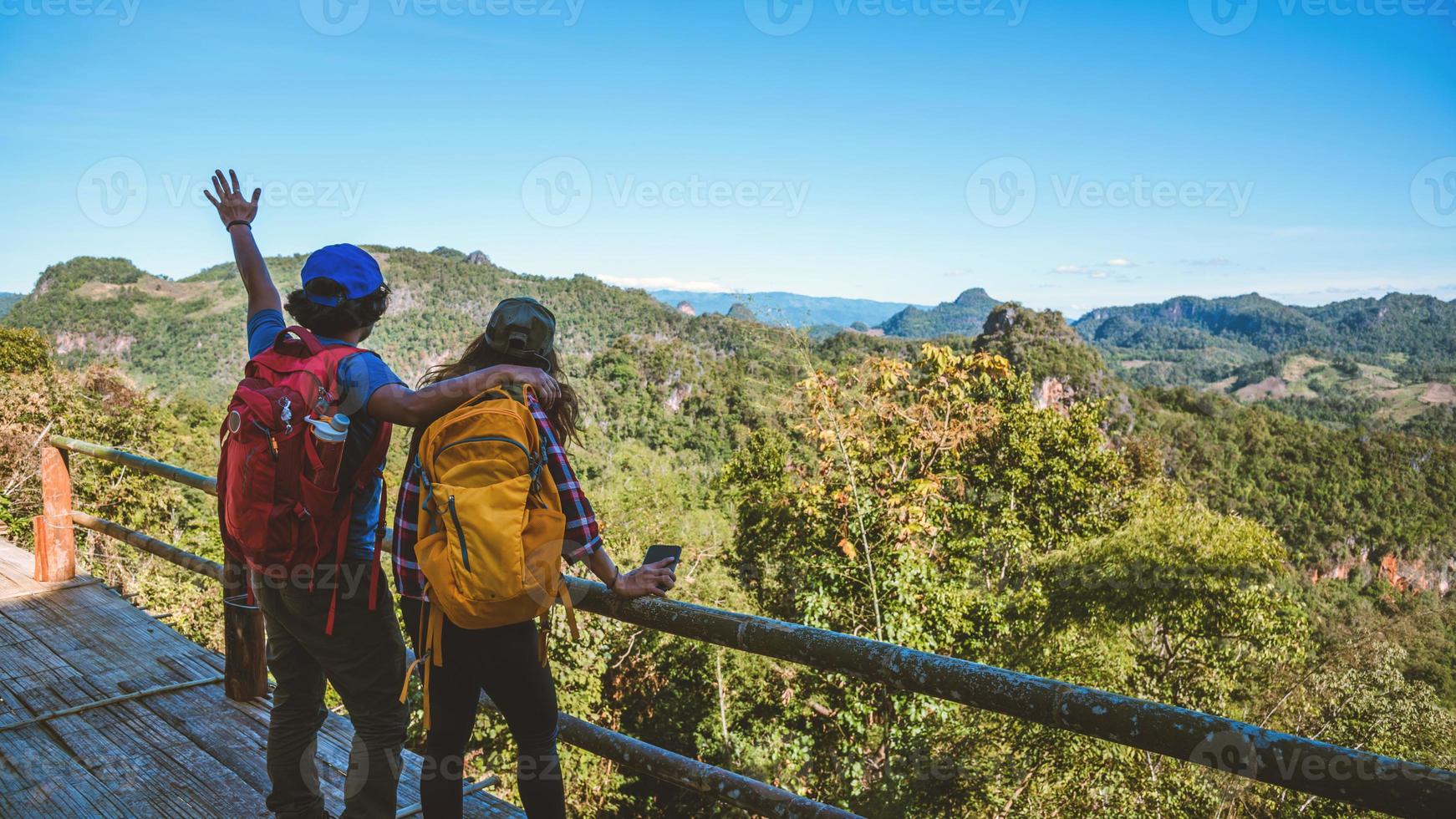 Travel, nature travel of Asian couples while is relaxing outdoors during his trip in Thailand. photo