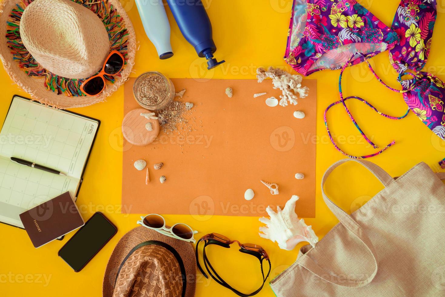 Beach outfit Accessories On bright yellow background - Summer Holiday Banner, Beach tourism concept. Summer concept, Travel nature, Travel relax. photo