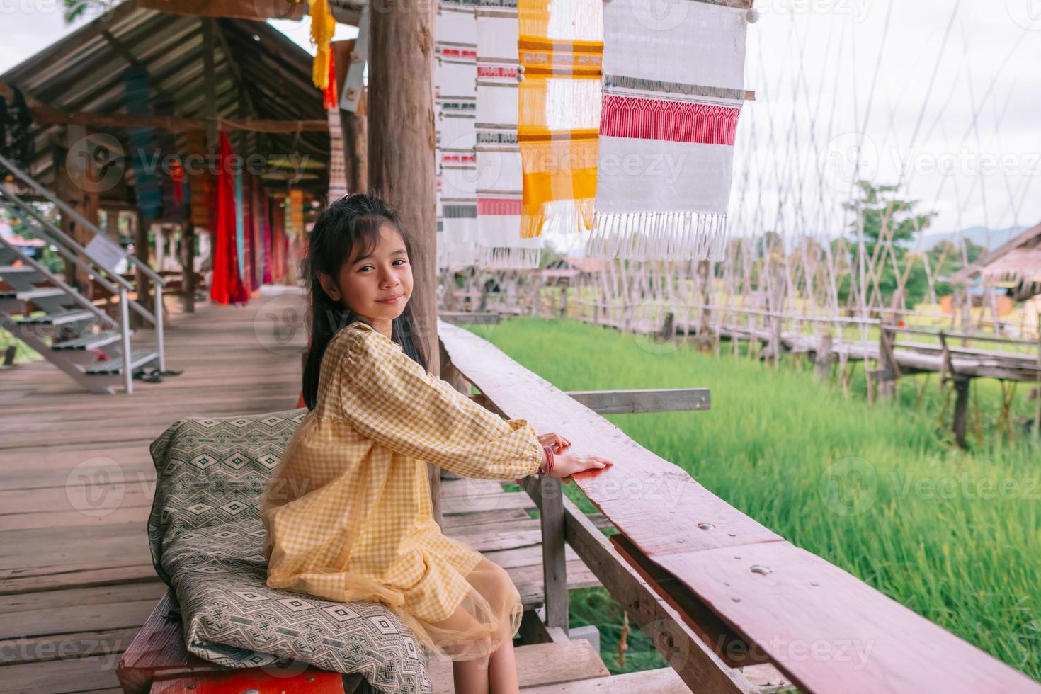 girl travel to Bantailue cafeA woman sitting and watching the scenery photo