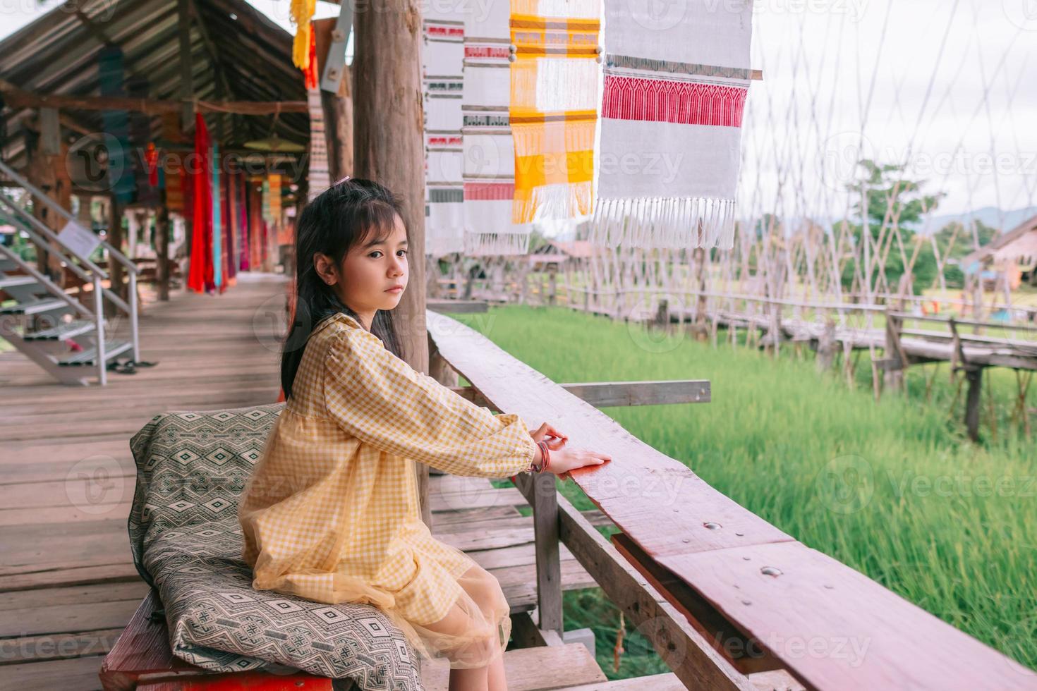 A woman sitting and watching the scenery photo