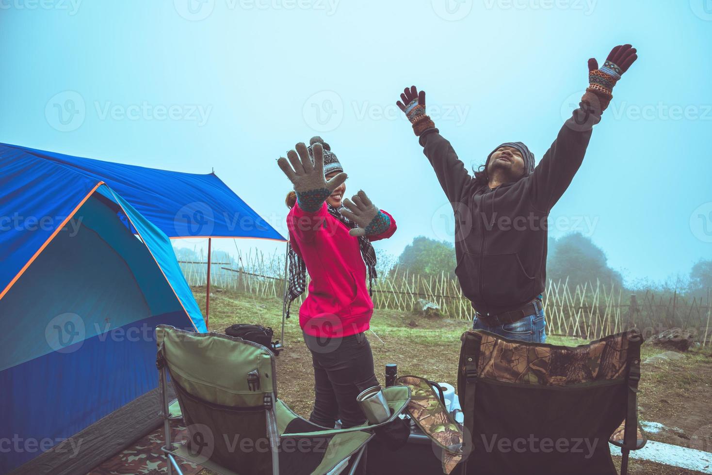 Lover women and men asians travel relax camping in the holiday. On the Moutain.Thailand photo