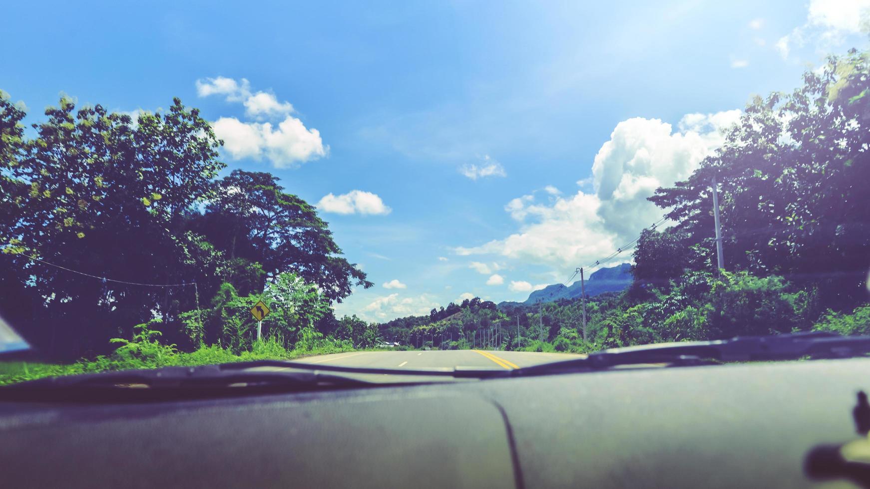 Landscape road paved road Rural Roadside View Mountain View. Road transport road. Car running on the street photo