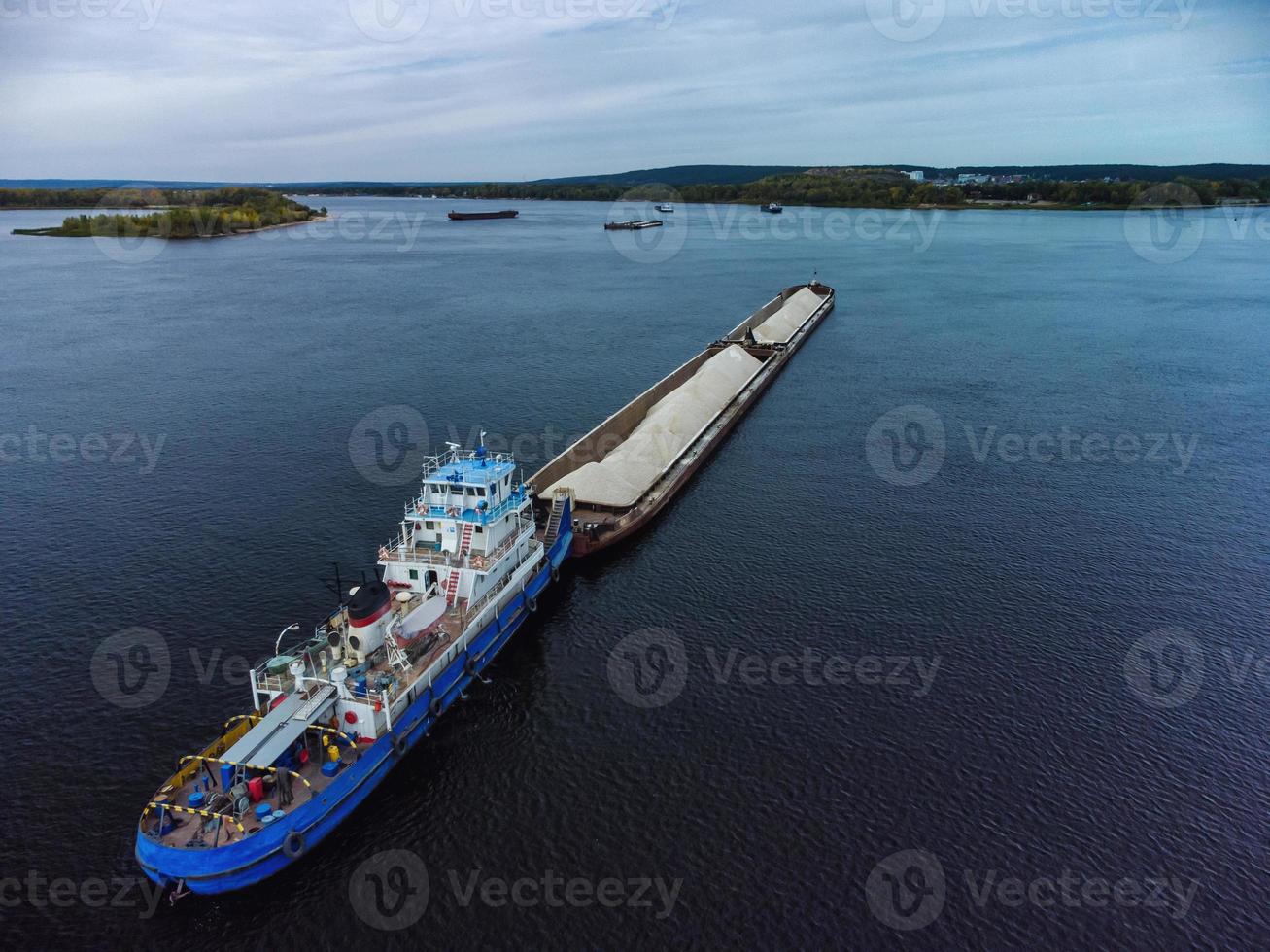 Aerial view of loaded dry cargo ship on river. photo