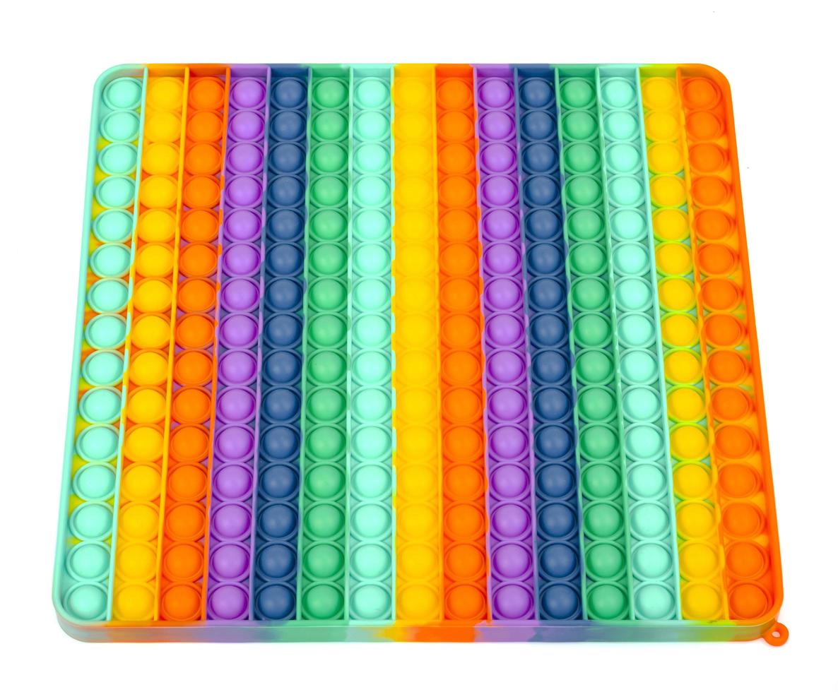 Square iridescent, multicolored simple dimple, pop it. Fashionable and modern anti stress toy for children and adults. photo