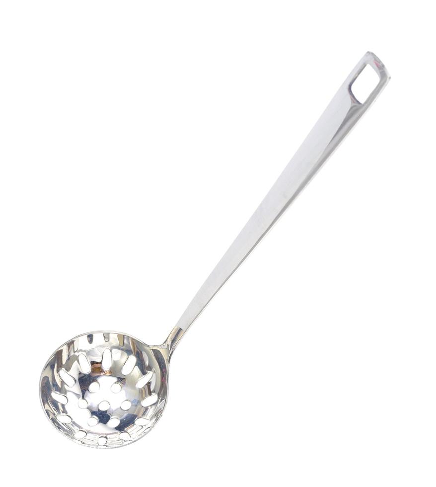Kitchen utensils spoon with slots, slotted spoon isolated on white background. Studio Photo