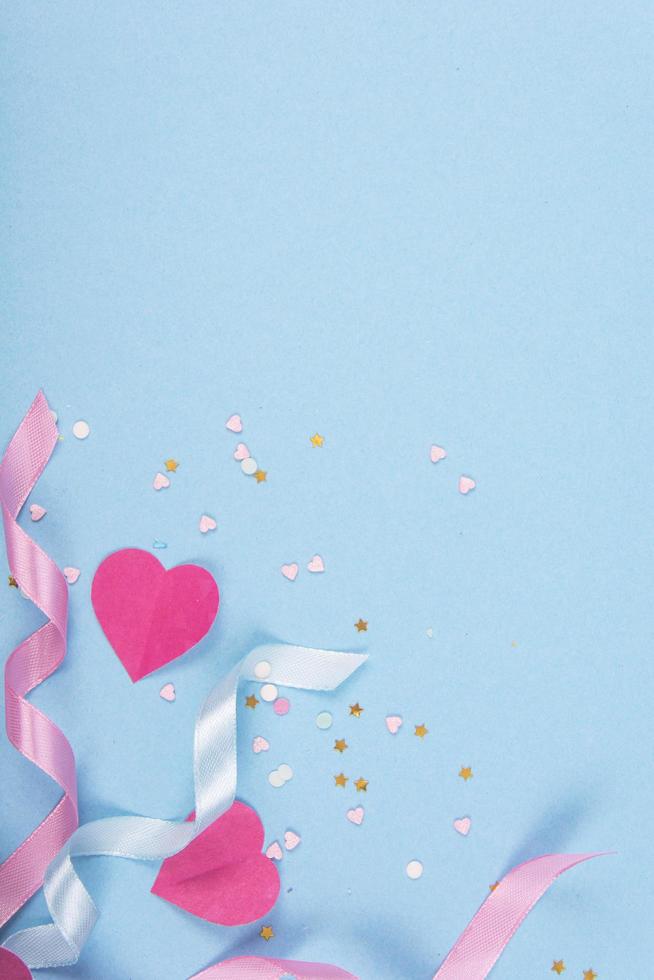 Abstract Background with Paper Hearts, ribbons for Valentine s Day. Blue Love and Feeling Background for poster, banner, post, card. photo