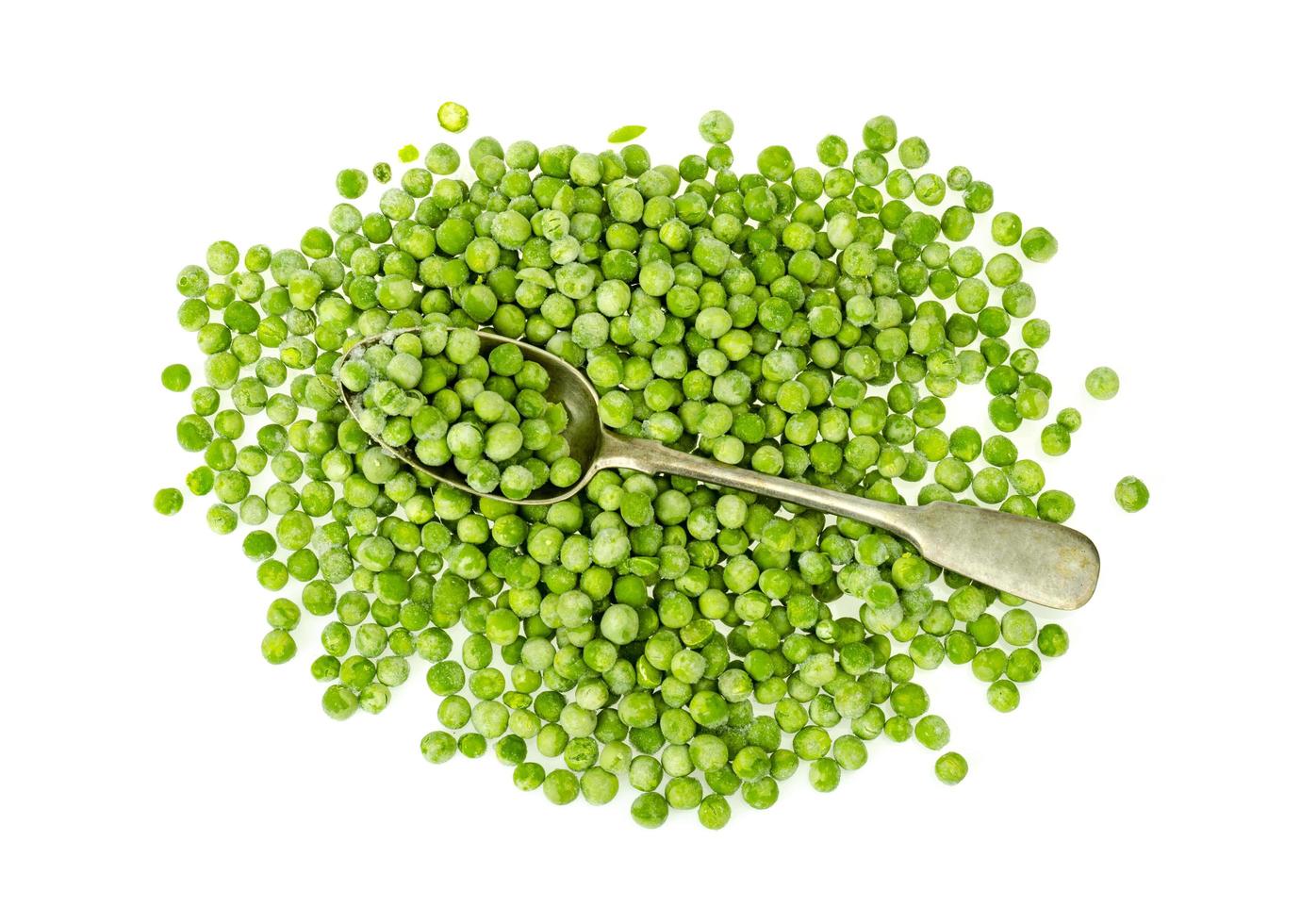 Pile of frozen blanched green peas isolated on white background. Healthy food. Studio Photo