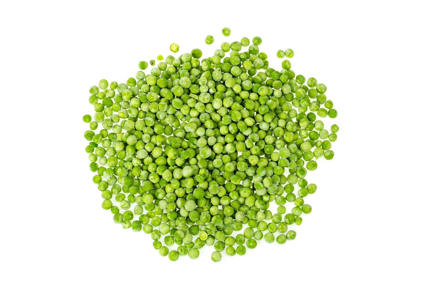 Pile of frozen blanched green peas isolated on white background. Healthy food. Studio Photo