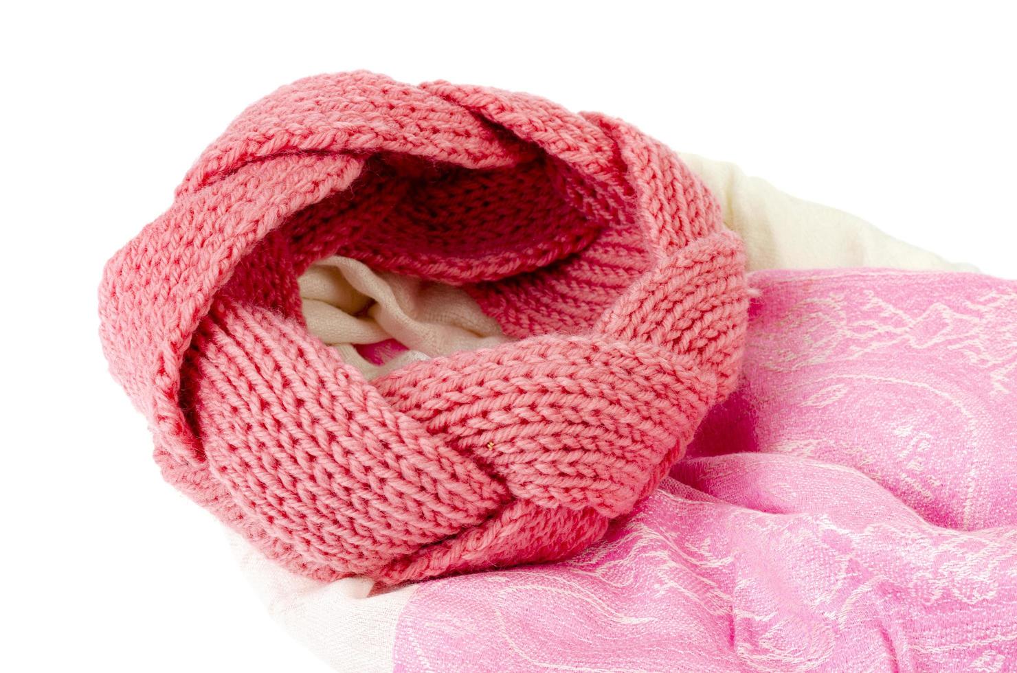 Beautiful pink headband, knitted from threads. Studio Photo