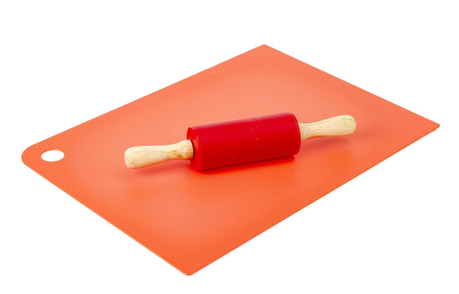 Kitchen silicone board and rolling pin dough roll. Studio Photo