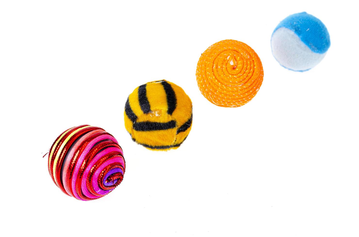 Products for animals, colored balls for cats and dogs. Studio Photo