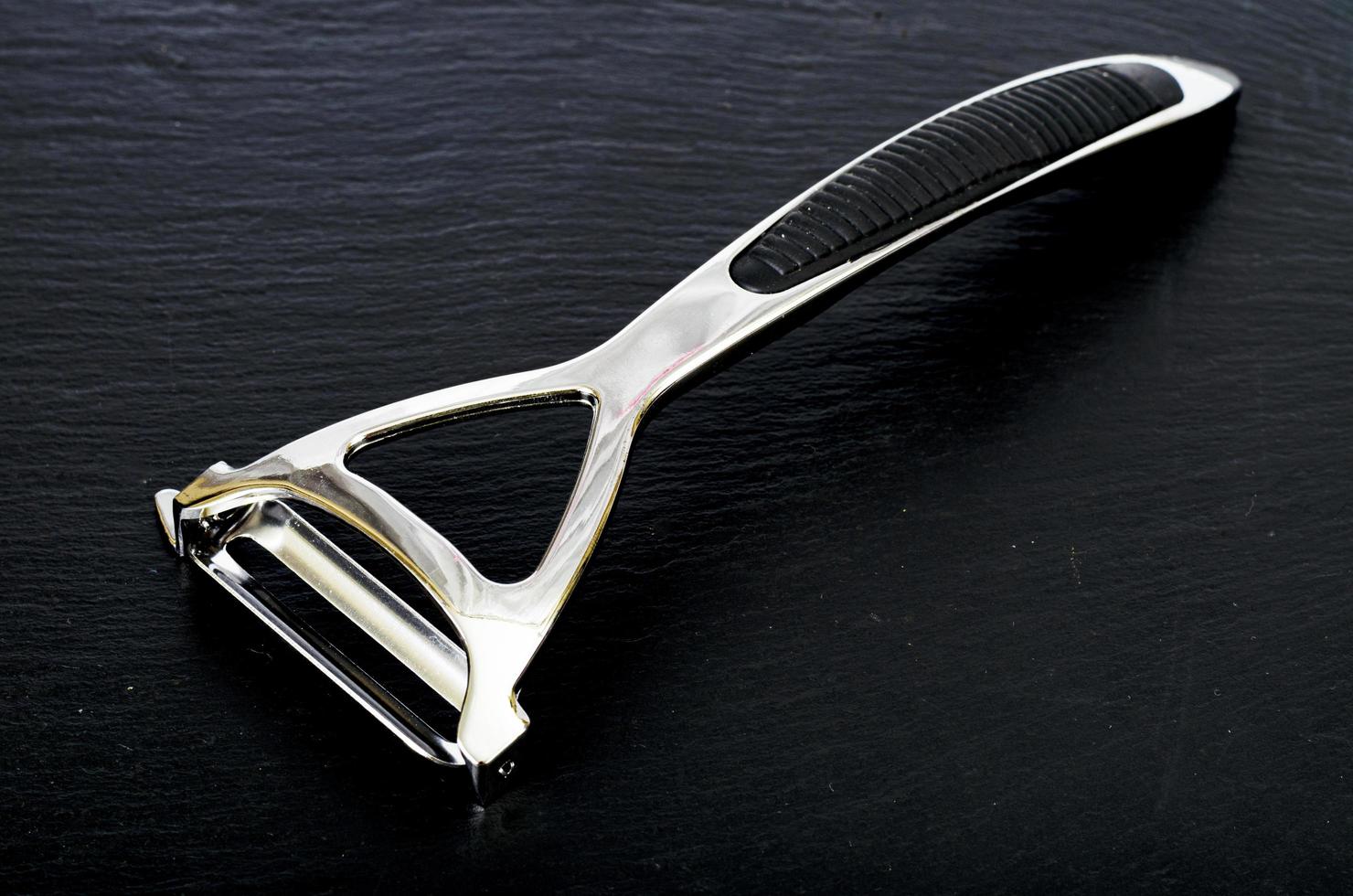 Peelers, kitchen gadgets for cleaning vegetables and fruits. Studio Photo