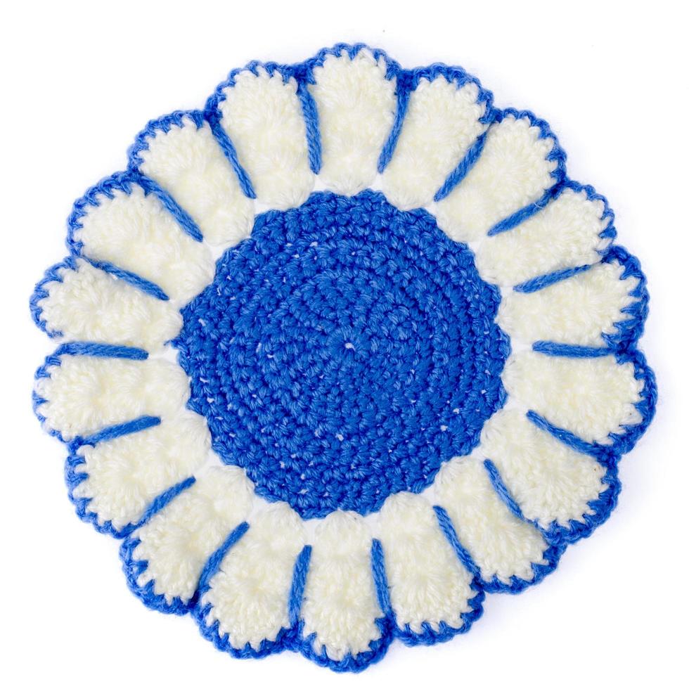 Knitted colored handmade napkins isolated on white background photo