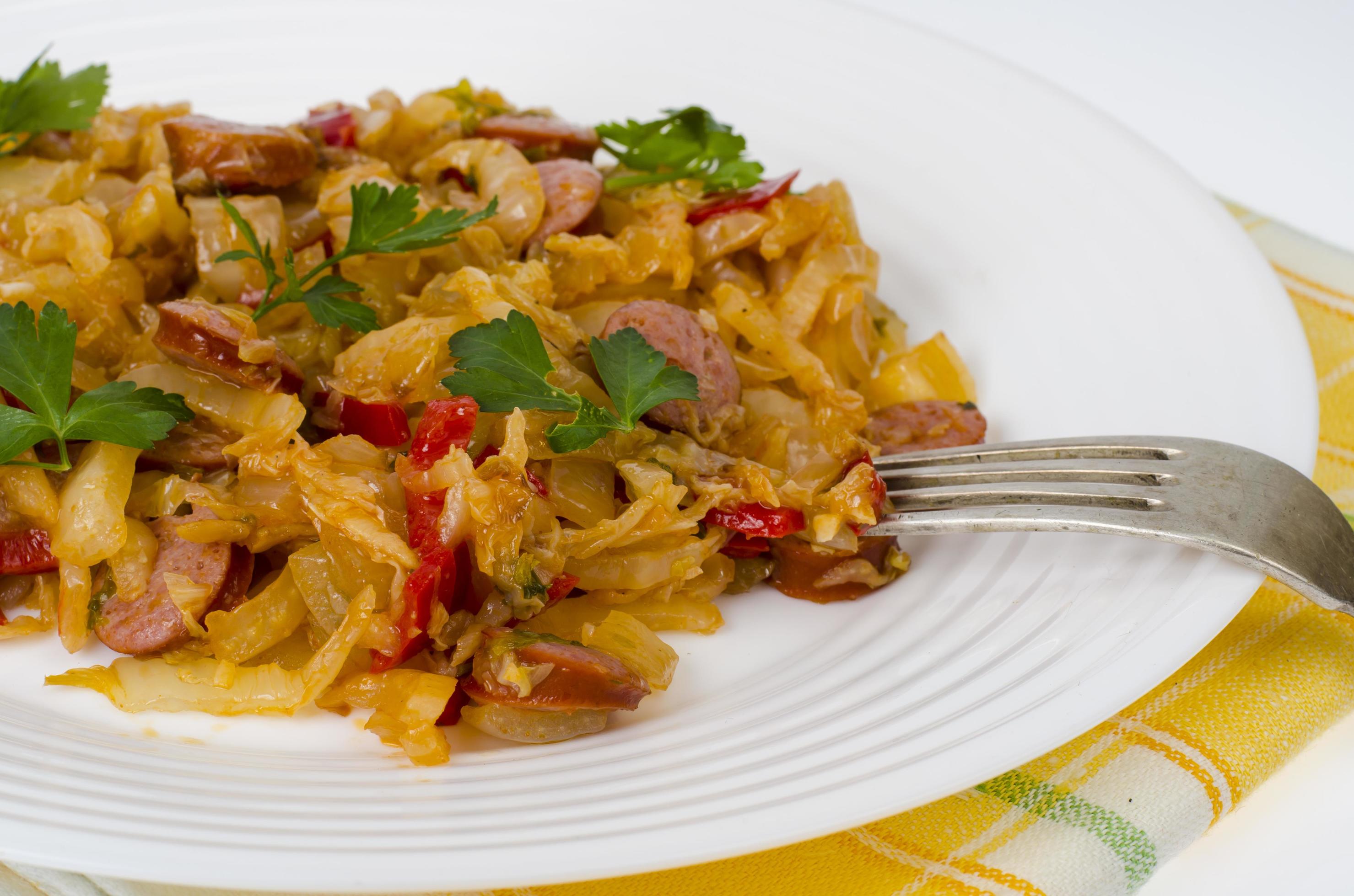 Stewed vegetables, cabbage, paprika with sausages. Photo 4412716 Stock Photo at Vecteezy