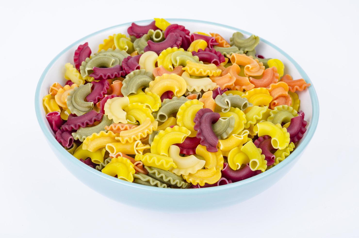 Colorful pasta with the addition of vegetable natural dyes, healthy eating. Studio Photo. photo