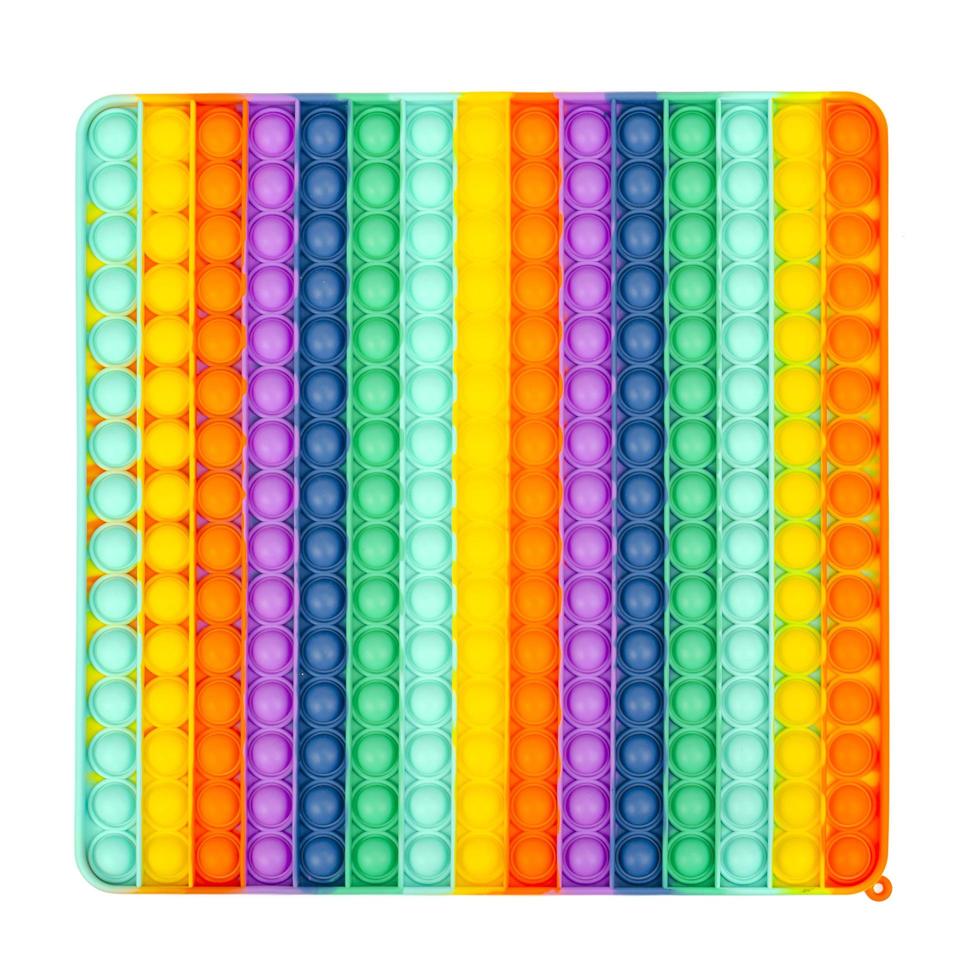 Square iridescent, multicolored simple dimple, pop it. Fashionable and modern anti stress toy for children and adults. photo