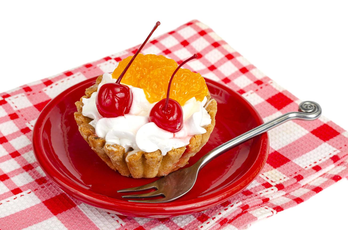 Cake with whipped cream and fruit, berries. photo