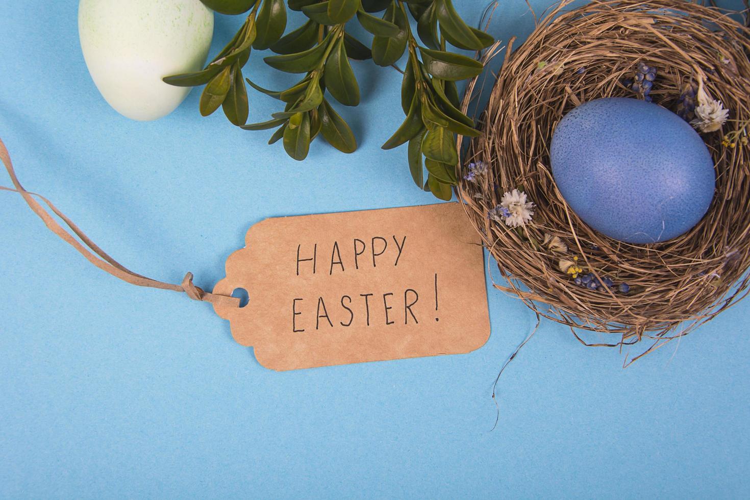 Colorful background with Easter eggs on blue background. Happy Easter concept. Can be used as poster, background, holiday card photo