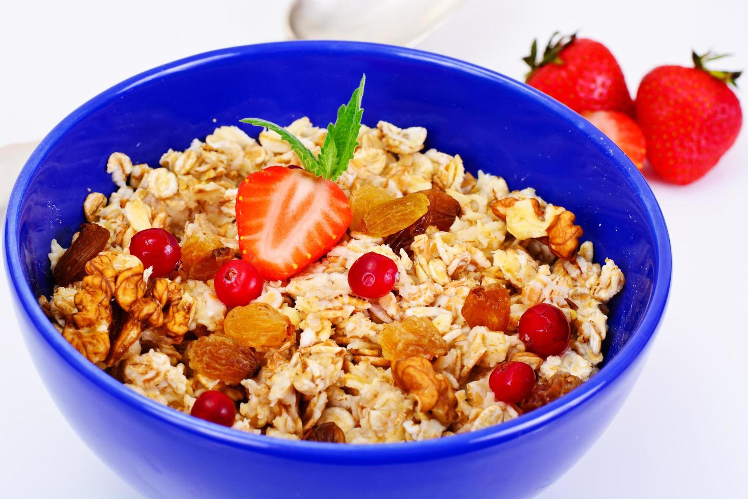 Oatmeal with Raisins, Walnuts and Strawberries photo