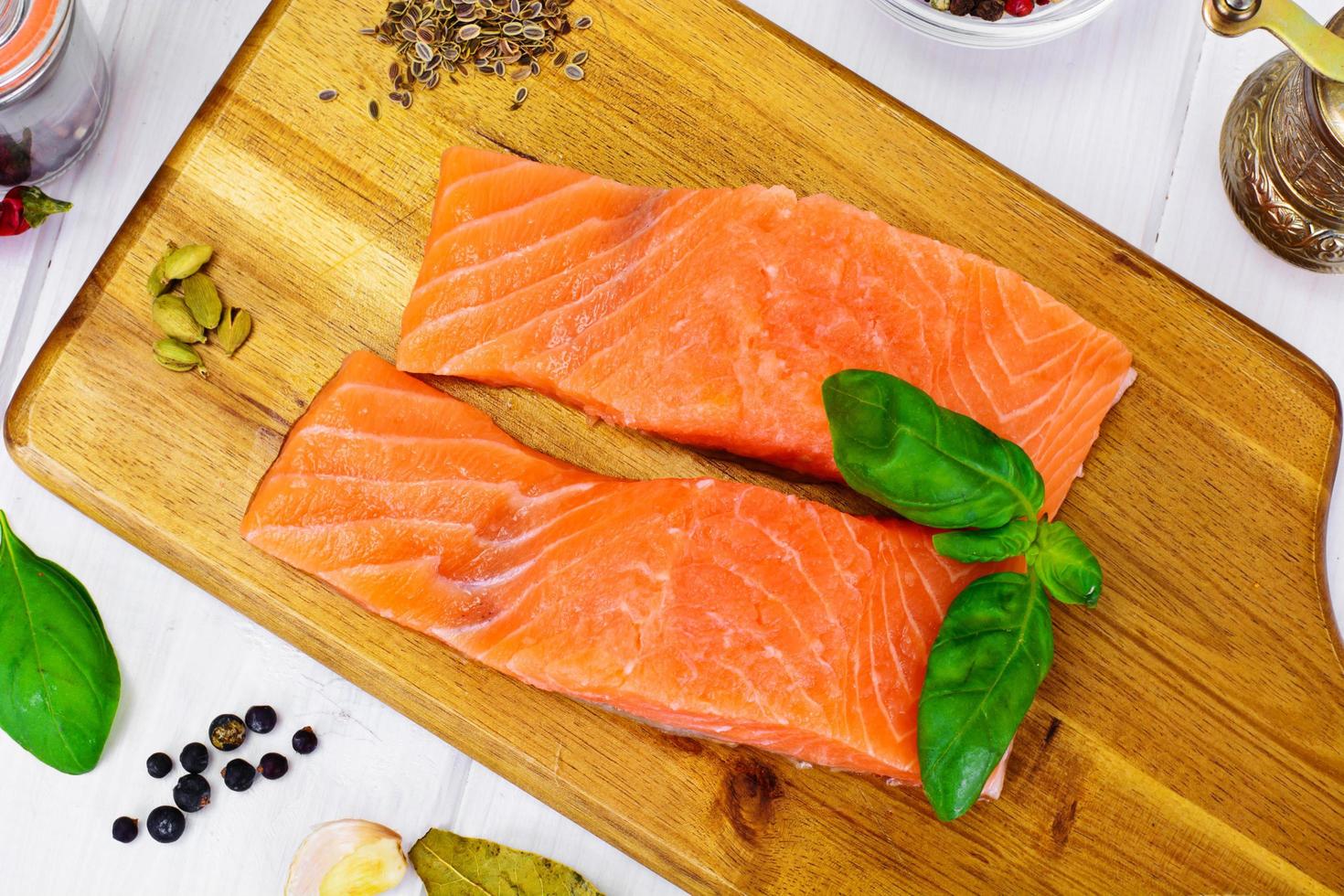 Fresh Salmon on wood photo