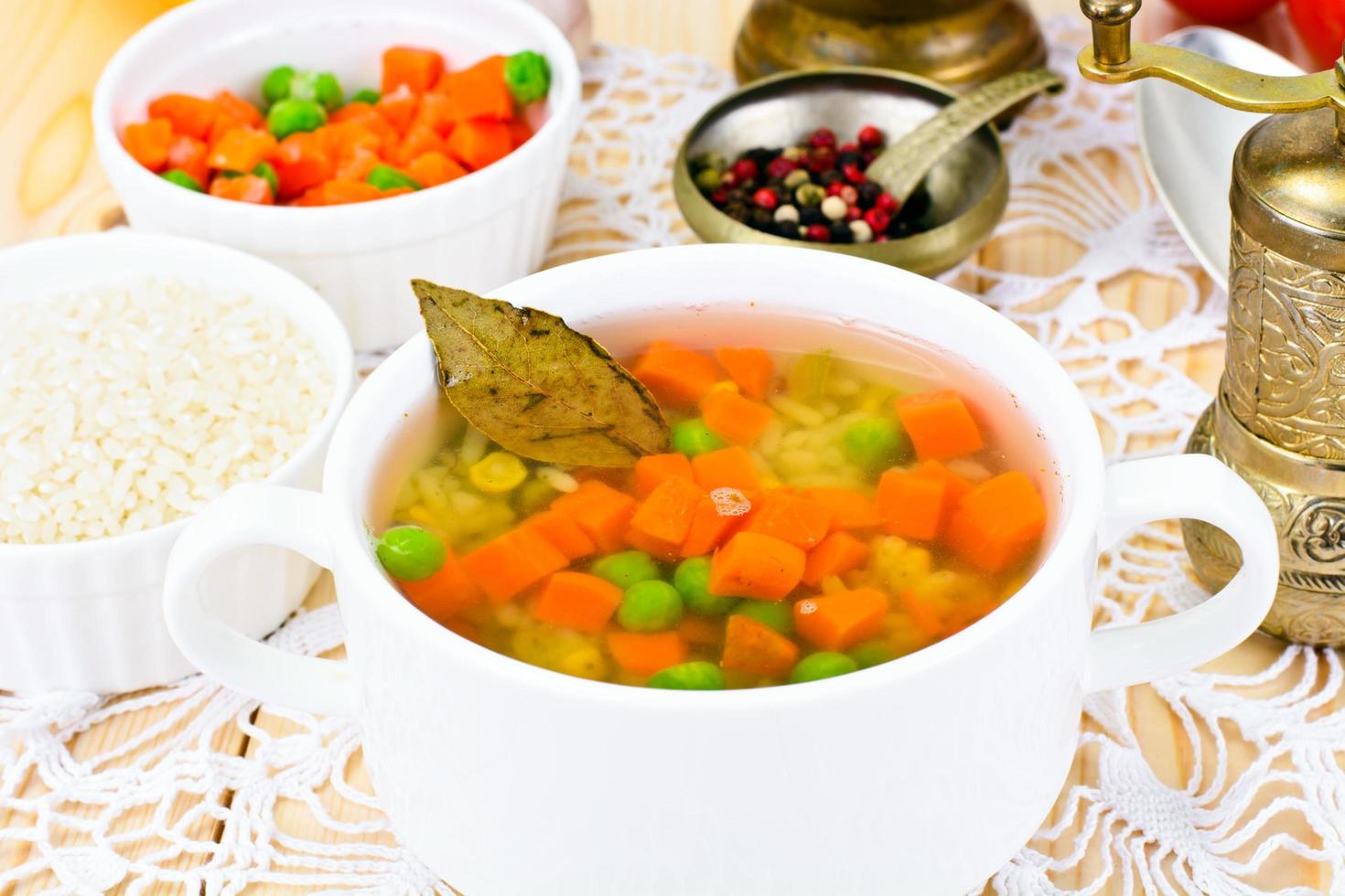 Soup with Chicken Broth. Rice and Vegetables photo