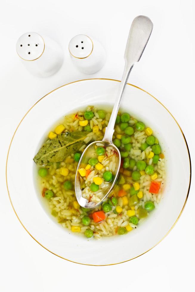 Soup with Chicken Broth. Rice and Vegetables photo