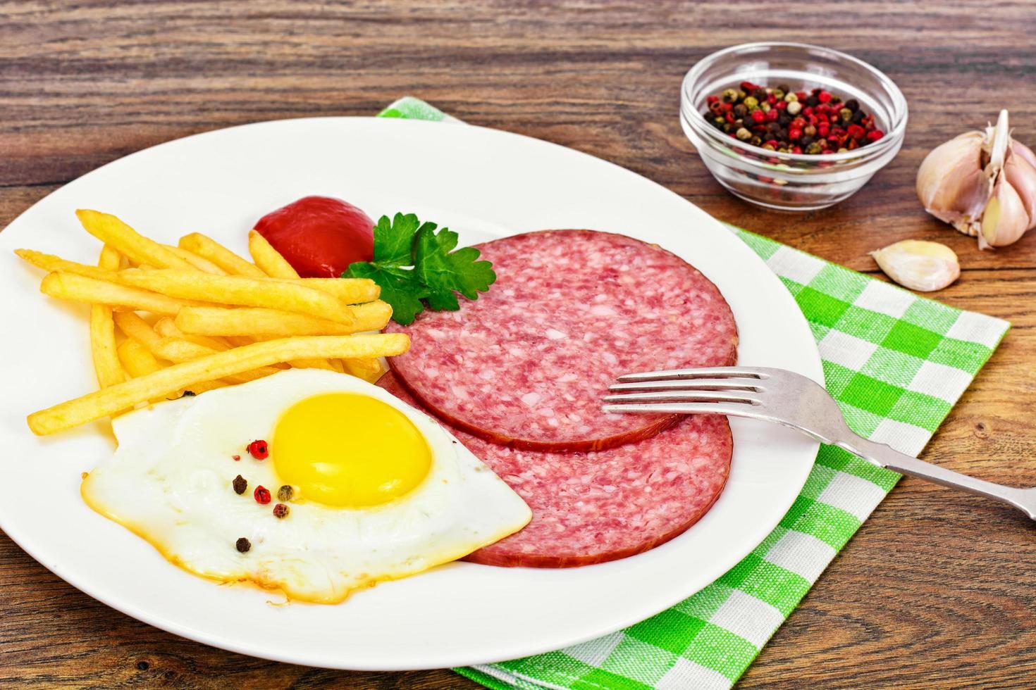 French Fries with Scrambled Eggs, Ham, Ketchup photo