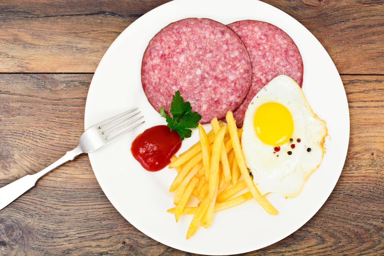 French Fries with Scrambled Eggs, Ham, Ketchup photo