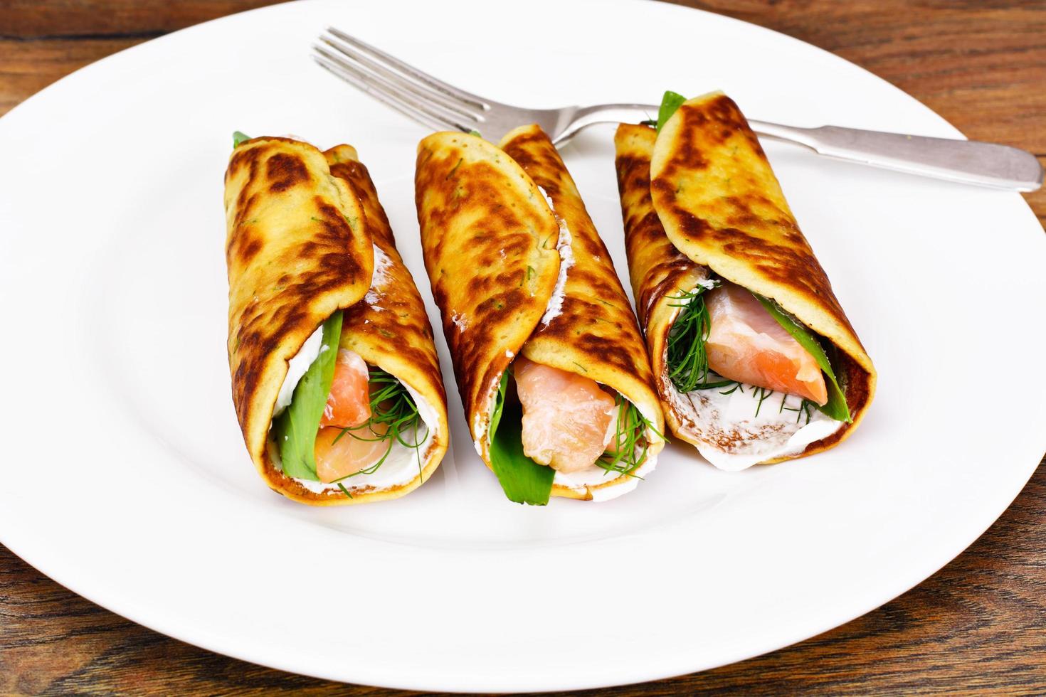 Pancake Rolls with Salmon Fried, Goat Cheese, Fennel and Wild Ga photo