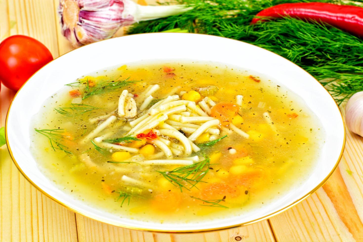 Soup with Chicken Broth. Noodles and Vegetables photo