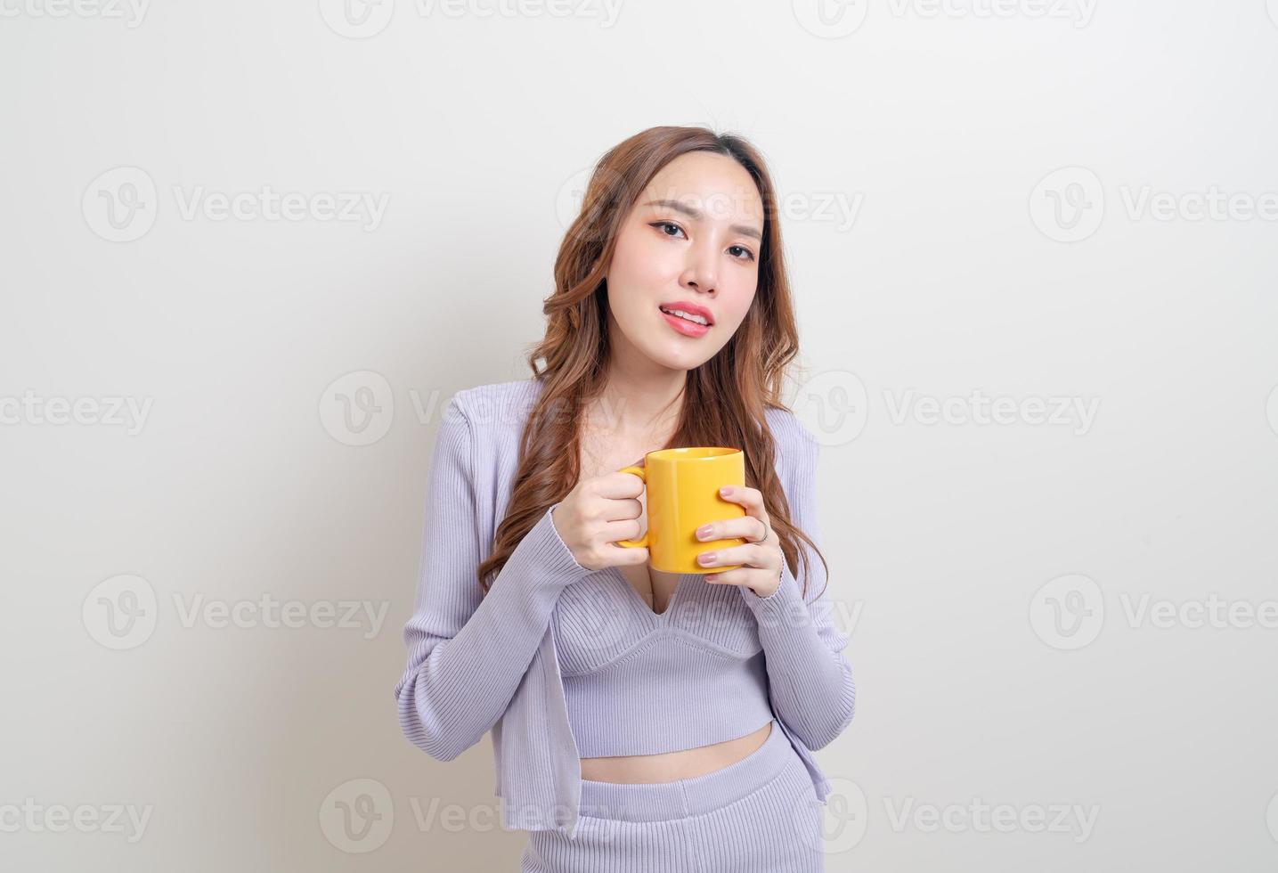 portrait beautiful Asian woman holding coffee cup or mug photo