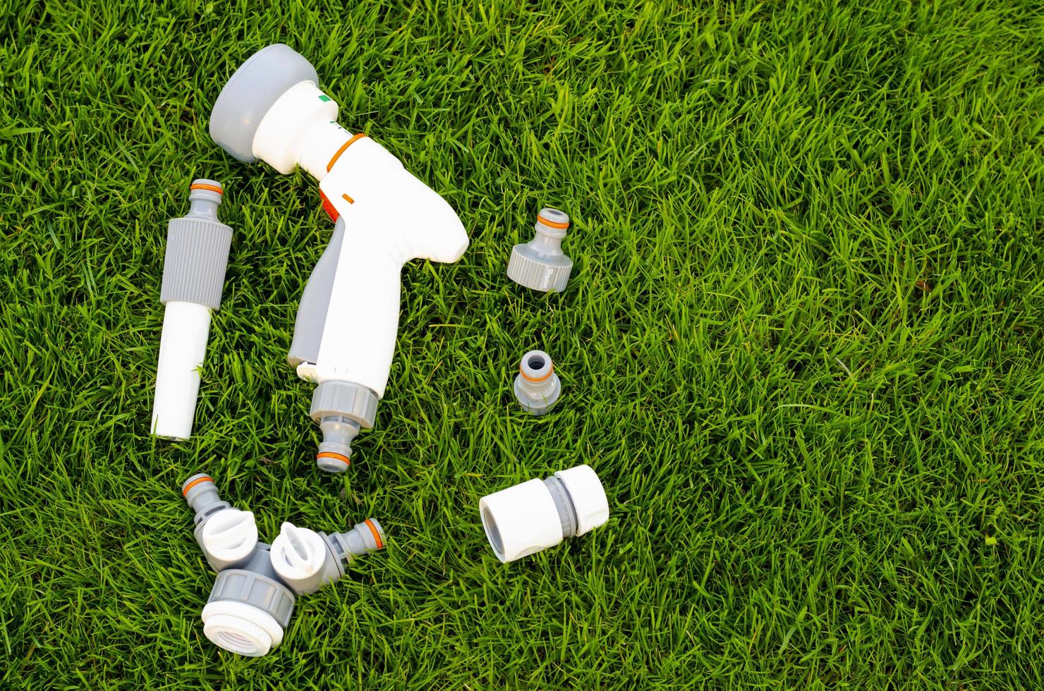 Plastic and hose for automatic watering the garden photo