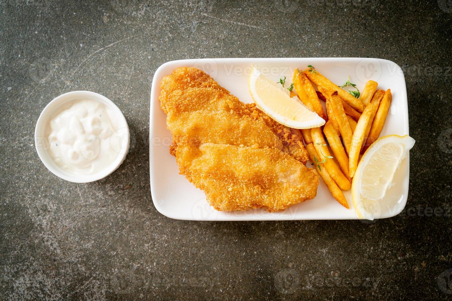 fish and chips - fried fish fillet with potatoes chips photo