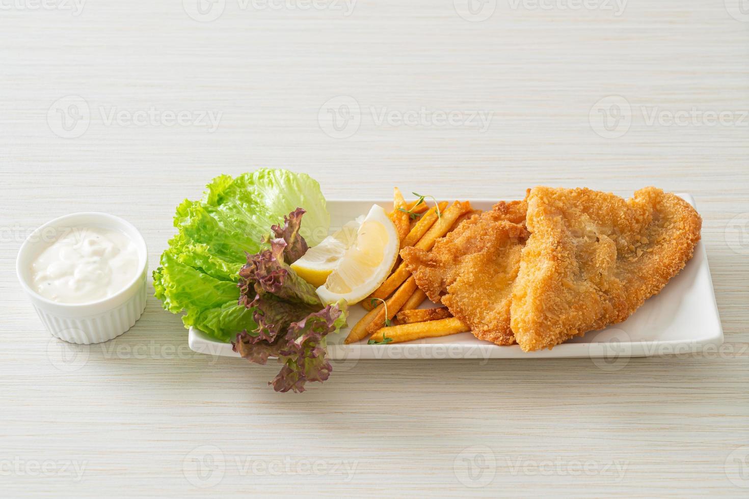 fish and chips - fried fish fillet with potatoes chips photo