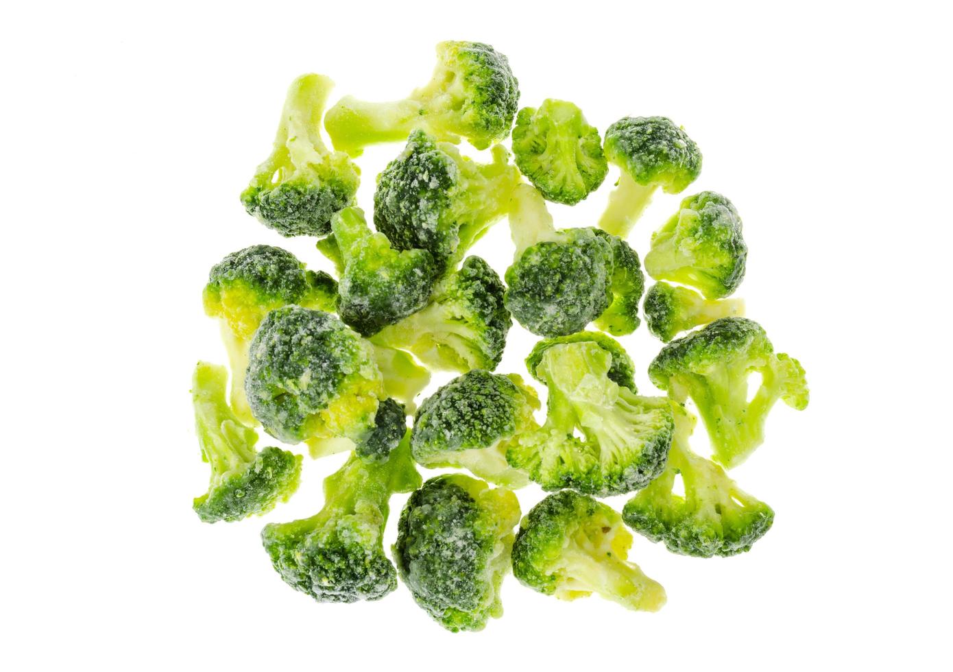 Preservation of vegetables, frozen broccoli cabbage on white background photo