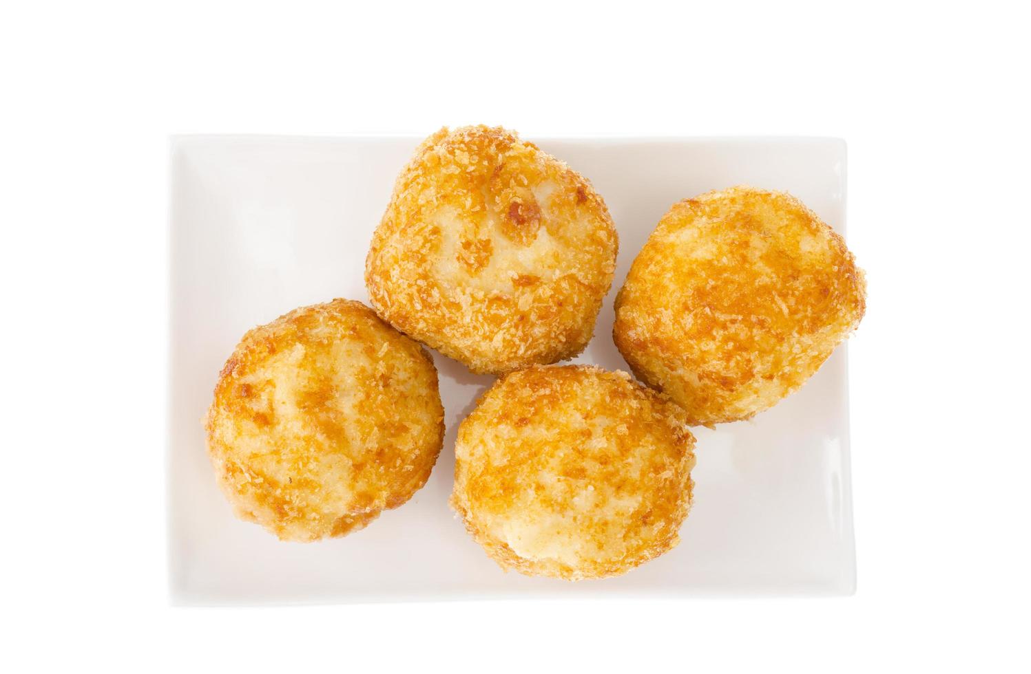 Cheese balls with chicken and mozzarella in batter and breadcrumbs photo
