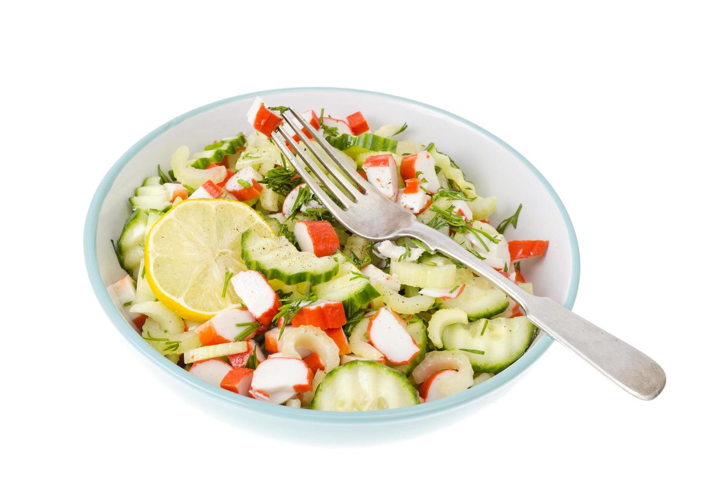 Vegetarian appetizer of cucumber, celery and surimi photo