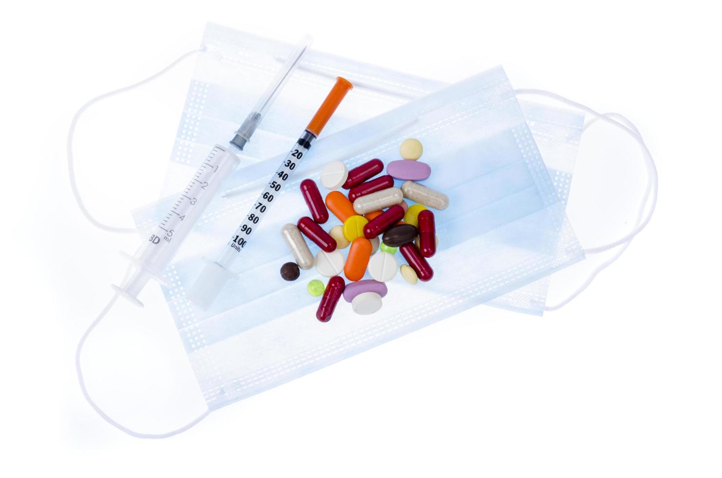 Medical masks, pills and capsules for recovery and disease prevention. photo