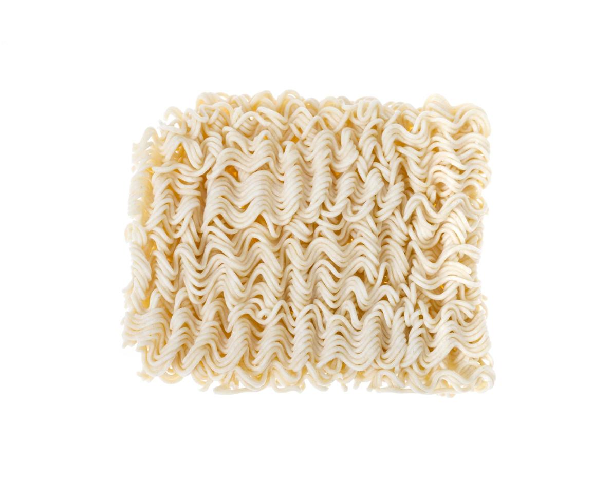Dry pressed instant noodles Isolated on white background. photo