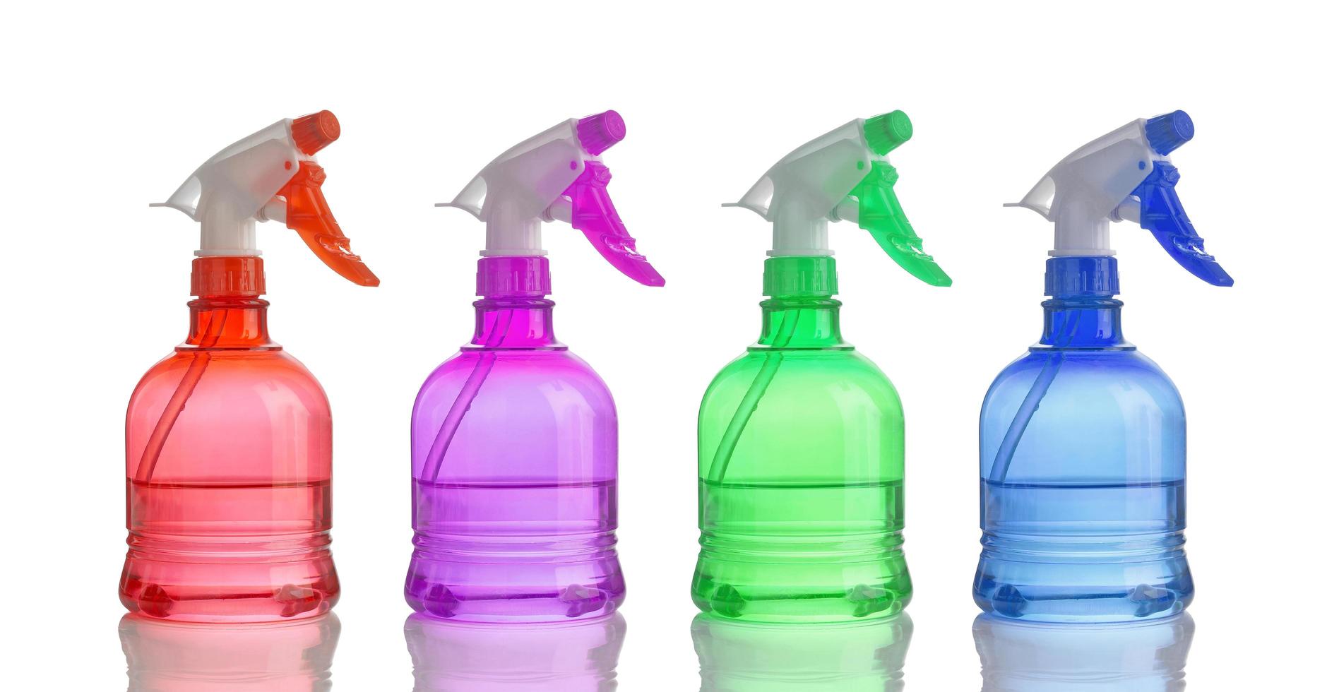 plastic bottle spray on white background photo