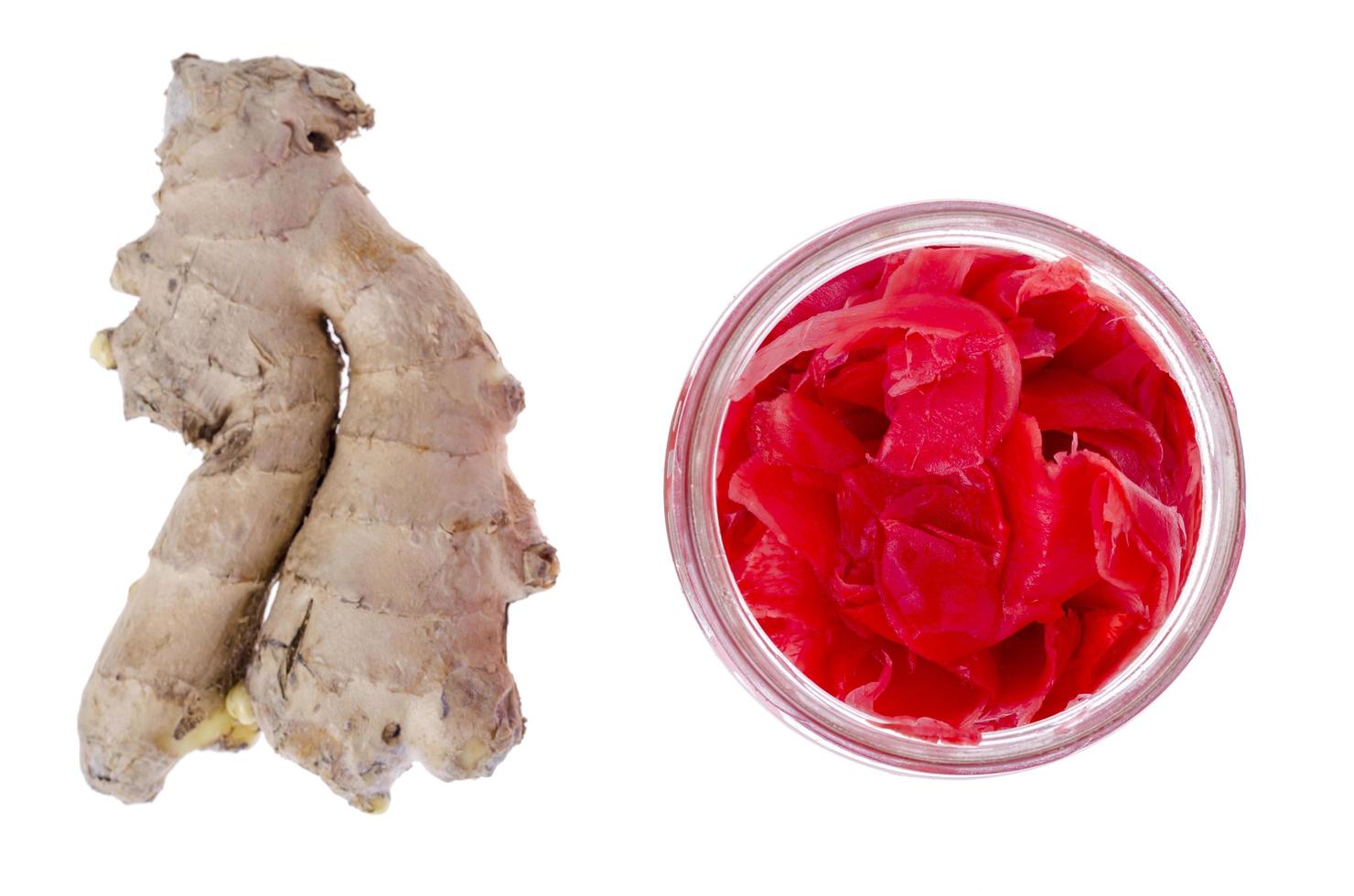 Fresh root and red pickled ginger. Photo